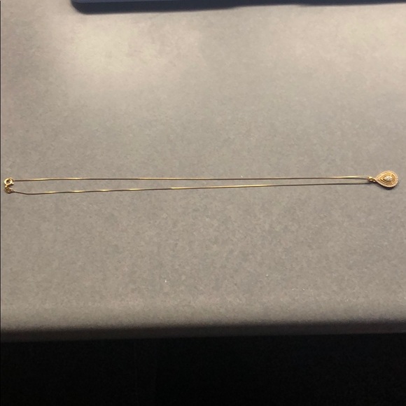 GOLD AND DIAMOND NECKLACE ON 20” CHAIN - Picture 2 of 4